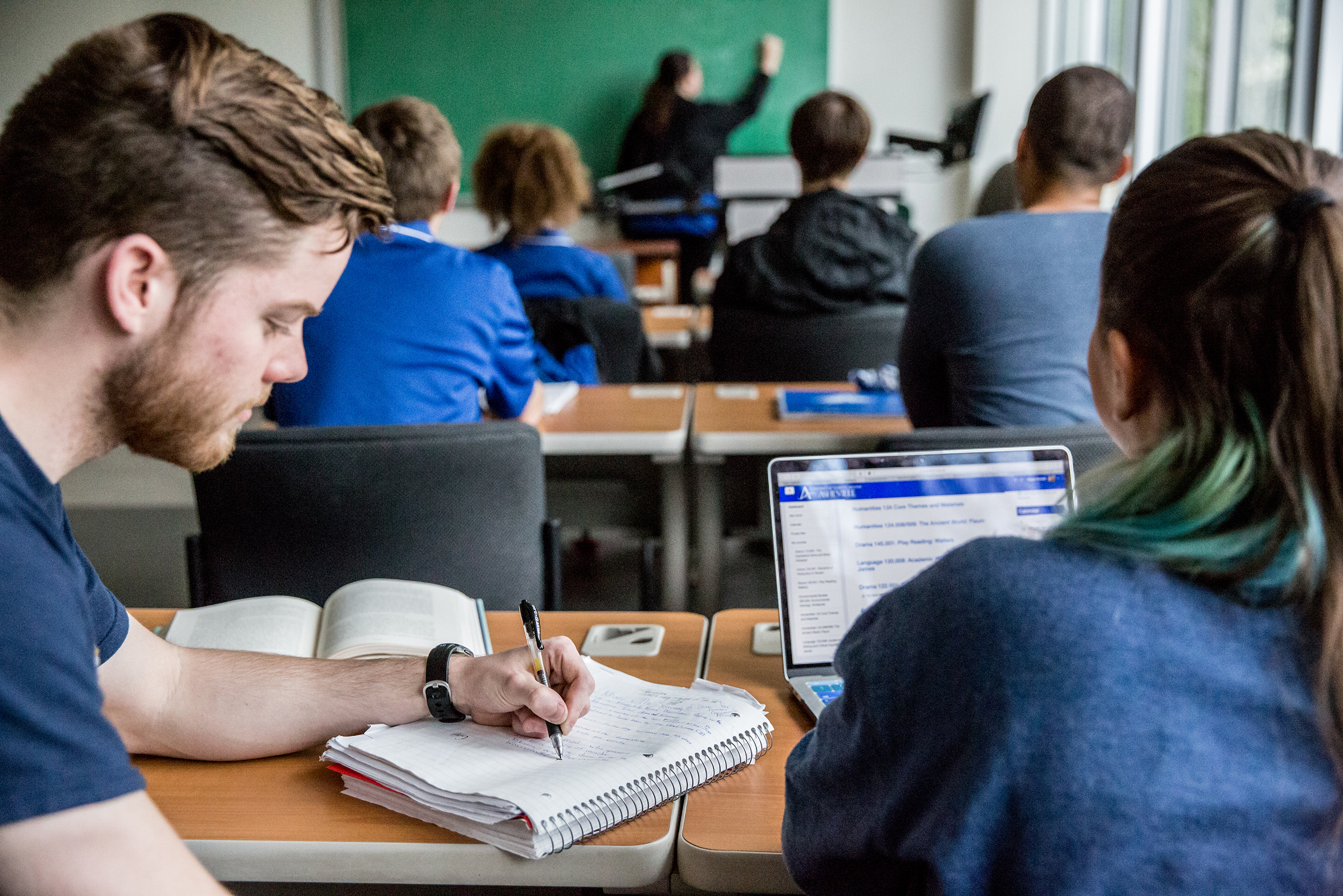 Students working together in a classroom